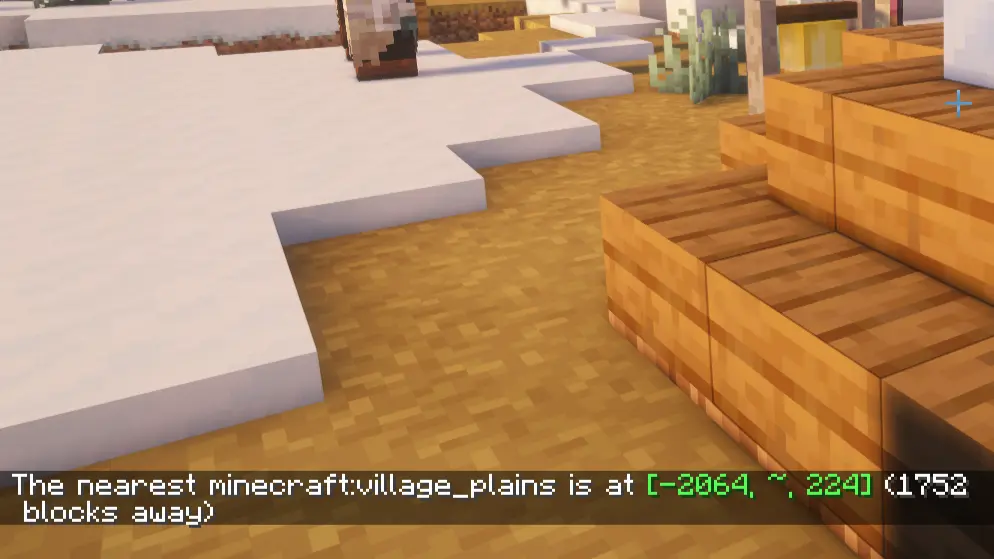 Minecraft chat showing village coordinates after running locate structure village command